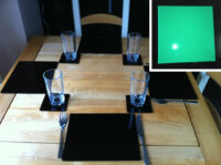 A photo of Set of 4 Perspex Place Mats and Coasters (Green)
